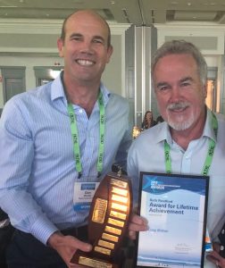 Greg Britton (on right) with Lifetime achievement award with colleague Dan Messiter